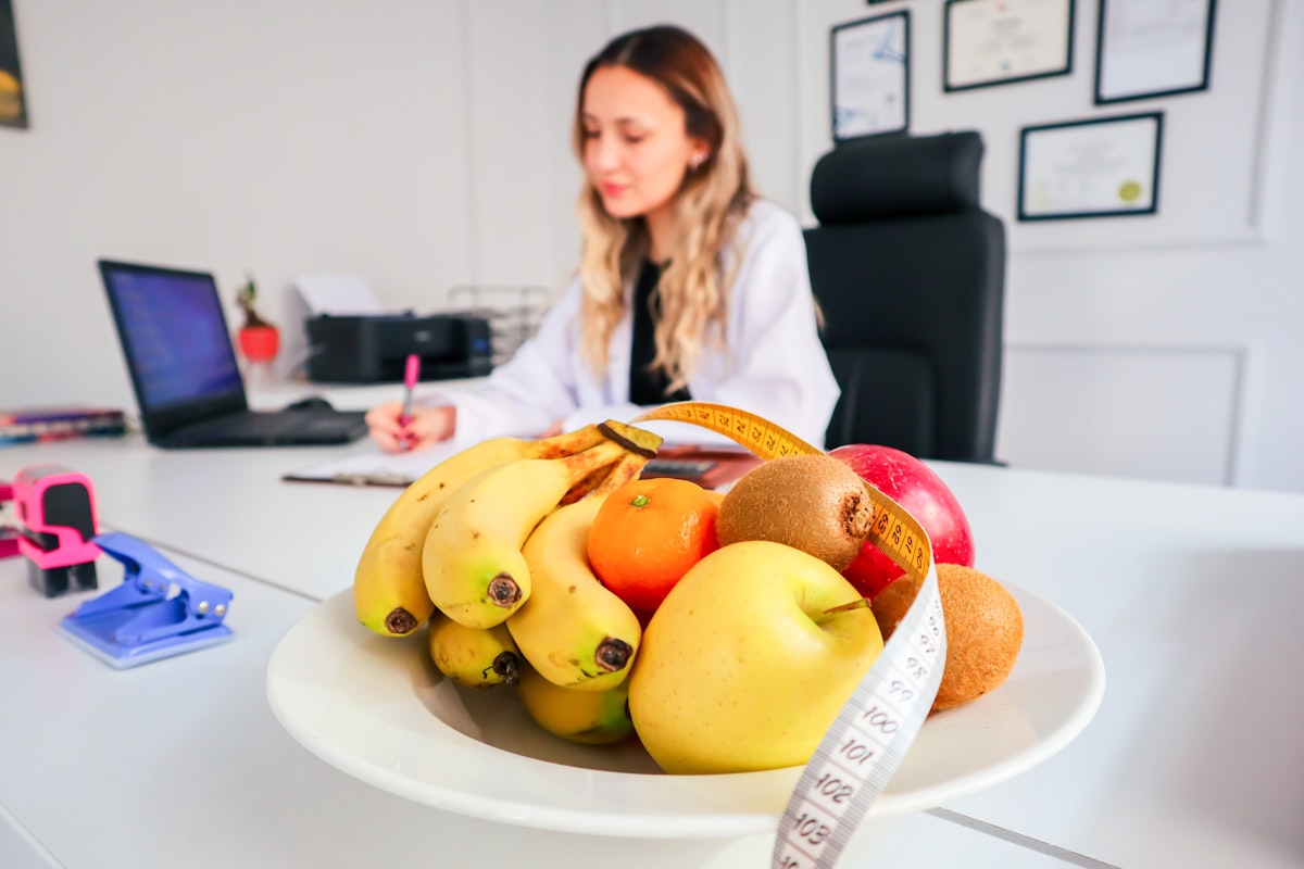 Certified nutritionist reviewing a personalized nutrition plan